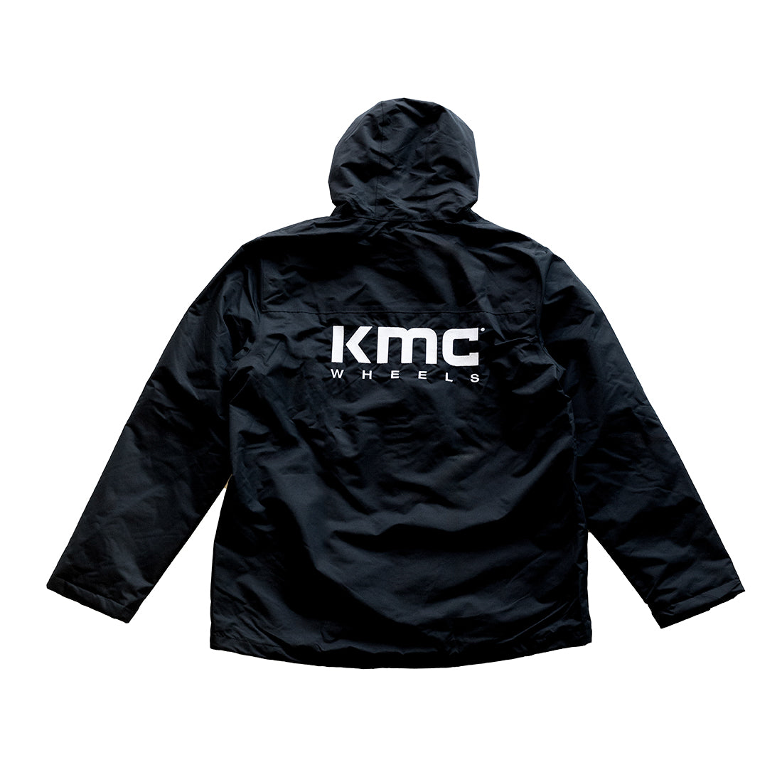 KMC Jacket in dark blue with a modern design, featuring a zippered front and adjustable hoodie.