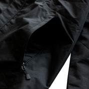 KMC Jacket in black, featuring a stylish design with zip closure and multiple pockets.