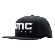 Black KMC LOGO snapback hat featuring a bold embroidered logo on the front and an adjustable closure.
