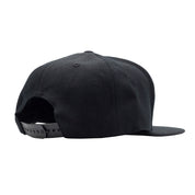 KMC logo snapback hat featuring a black base with the white KMC emblem on the front.