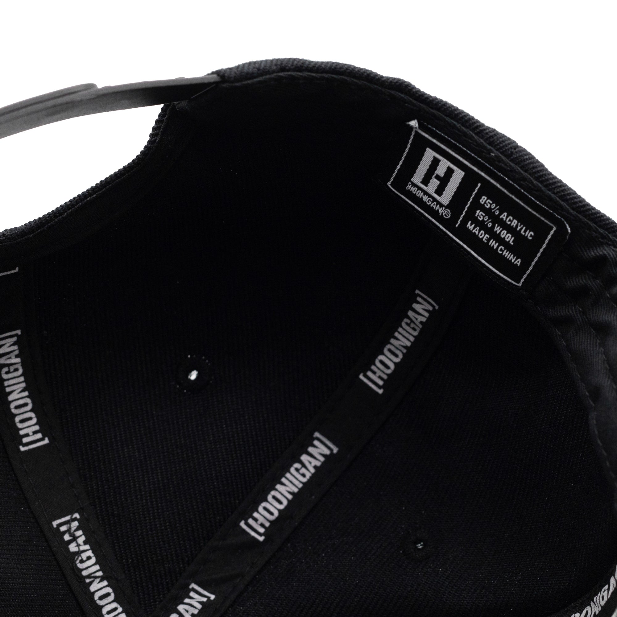 KMC Logo Snapback Hat featuring a bold embroidered logo on the front and an adjustable snap closure.