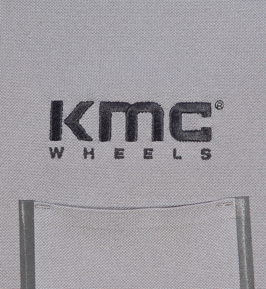 KMC Wheel grey short sleeve polo shirt with embroidered logo on the chest.