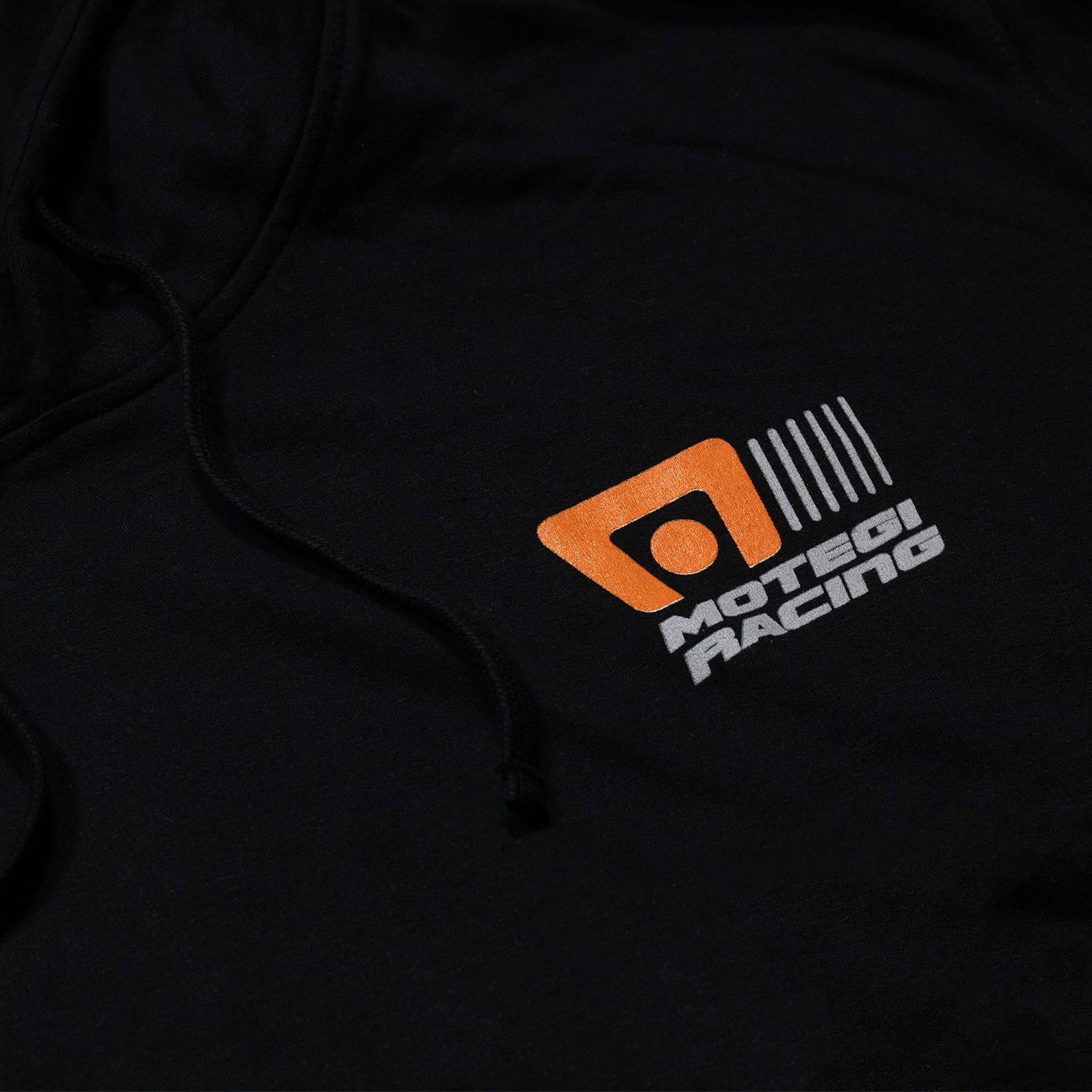 Motegi Racing logo hoodie featuring a black design with a prominent white logo on the front.