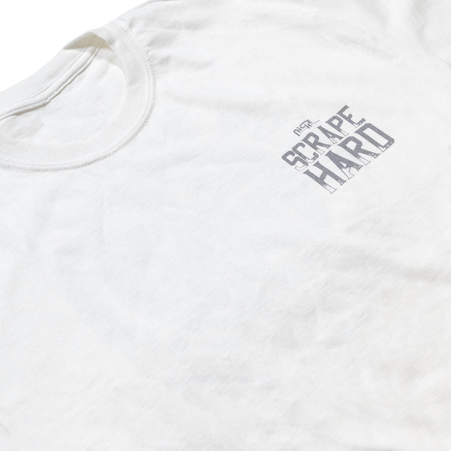 Niche SCRAPE HARD Short Sleeve Tee in black with white graphic design, displayed on a plain background.