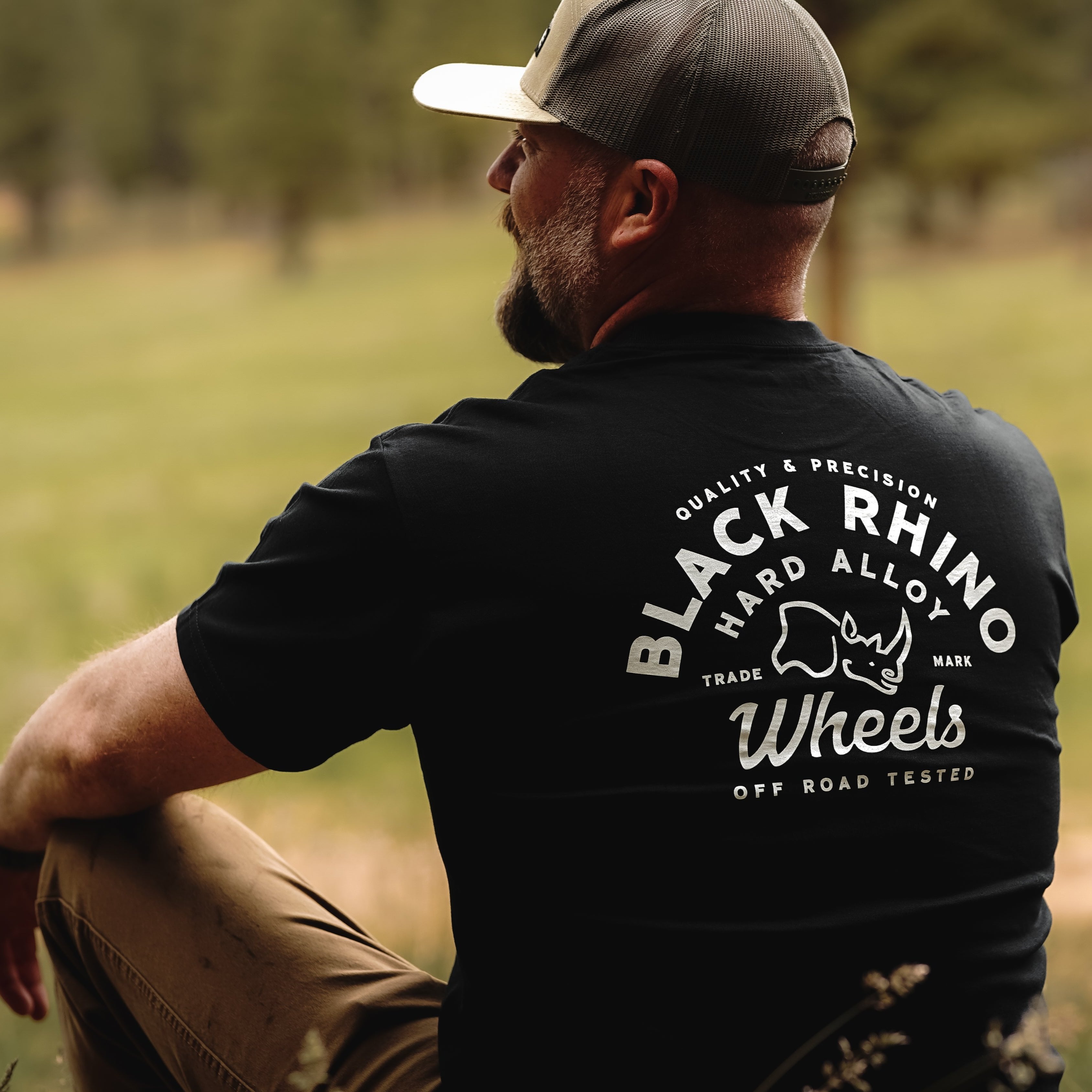 Black Rhino FLYER Short Sleeve Tee in black featuring a bold graphic design on the front.