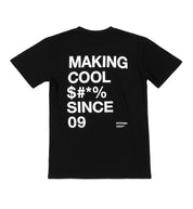 Black short sleeve tee featuring "MAKING COOL $#*&" graphic in bold white lettering.