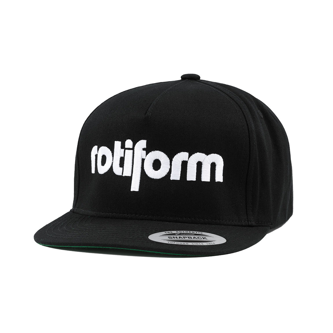 Rotiform STAPLE Snapback Hat in black and white featuring an embroidered logo on the front.