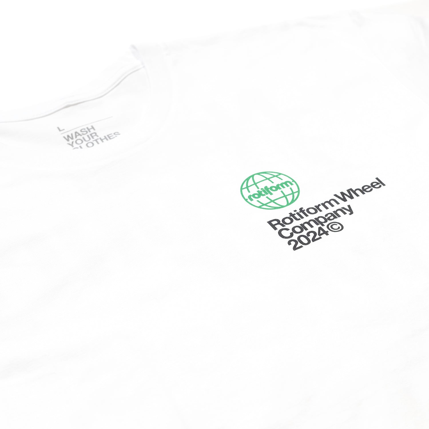 Rotiform NEED WHEELS Short Sleeve Tee featuring a vibrant graphic on a black background.