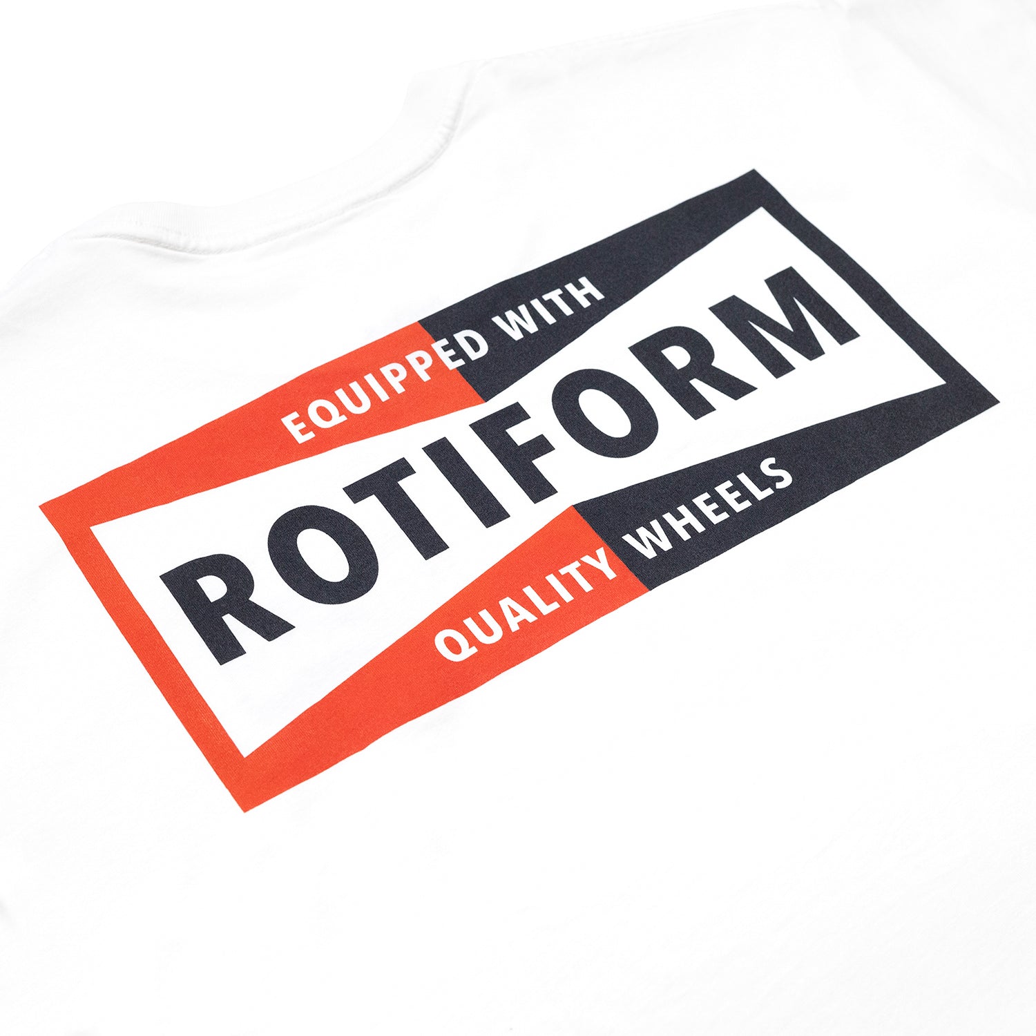 Rotiform NEED THAT PLUG Short Sleeve Tee featuring a bold graphic design on a black fabric background.