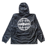 Black Rotiform GLOBAL IMPACT half-zip anorak jacket with a large white globe logo on the back and a hood, made of lightweight, water-resistant material.