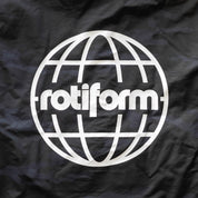 Black Rotiform GLOBAL IMPACT half zip anorak jacket with a white globe logo and "rotiform" text on the front.