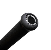 Close-up of the handle of the Rotiform SHADE SEEKER Umbrella, featuring a textured grip and branded end cap.