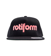 Rotiform STAPLE snapback hat in black featuring a prominent white Rotiform logo on the front panel.