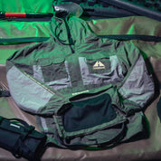 Hoonigan H.A.V.O.C. rain-activated windbreaker jacket with multiple pockets, adjustable hood, and reflective accents.