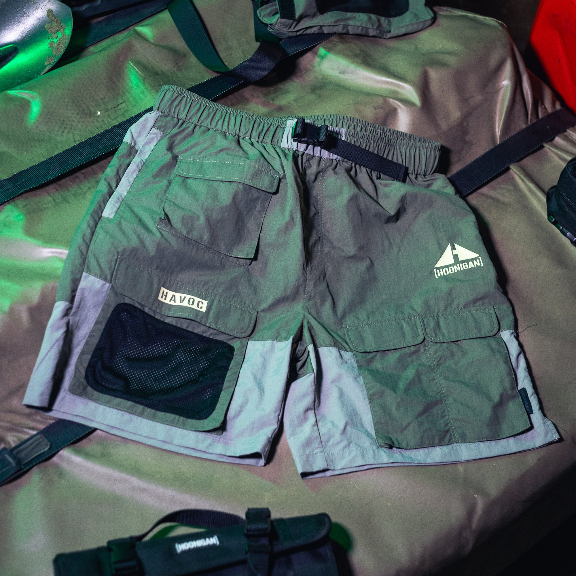 Hoonigan H.A.V.O.C. rain-activated cargo shorts with multiple pockets, adjustable waistband, and durable outdoor fabric.