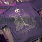 Back of a purple Hoonigan TOPOGRAPHIC TERRAIN short sleeve tee featuring a white topographic map design, logo, and coordinates.