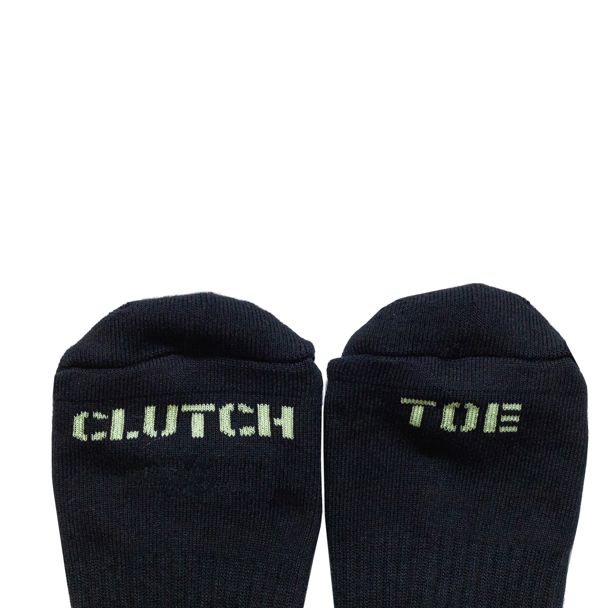 Hoonigan glow-in-the-dark socks featuring "CLUTCH" and "TOE" text on the toes for automotive enthusiasts.