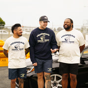 Hoonigan TRACK TEAM athletic shorts in black with white logo, designed for comfort and performance.