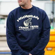 Hoonigan TRACK TEAM pullover sweatshirt in black with logo graphic on chest and striped sleeves.