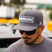 Hoonigan CENSOR BAR Snapback Hat in black with white logo and adjustable strap.
