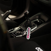 Hoonigan x Sayaka 4.75" Air Freshener featuring a colorful design with Hoonigan branding.