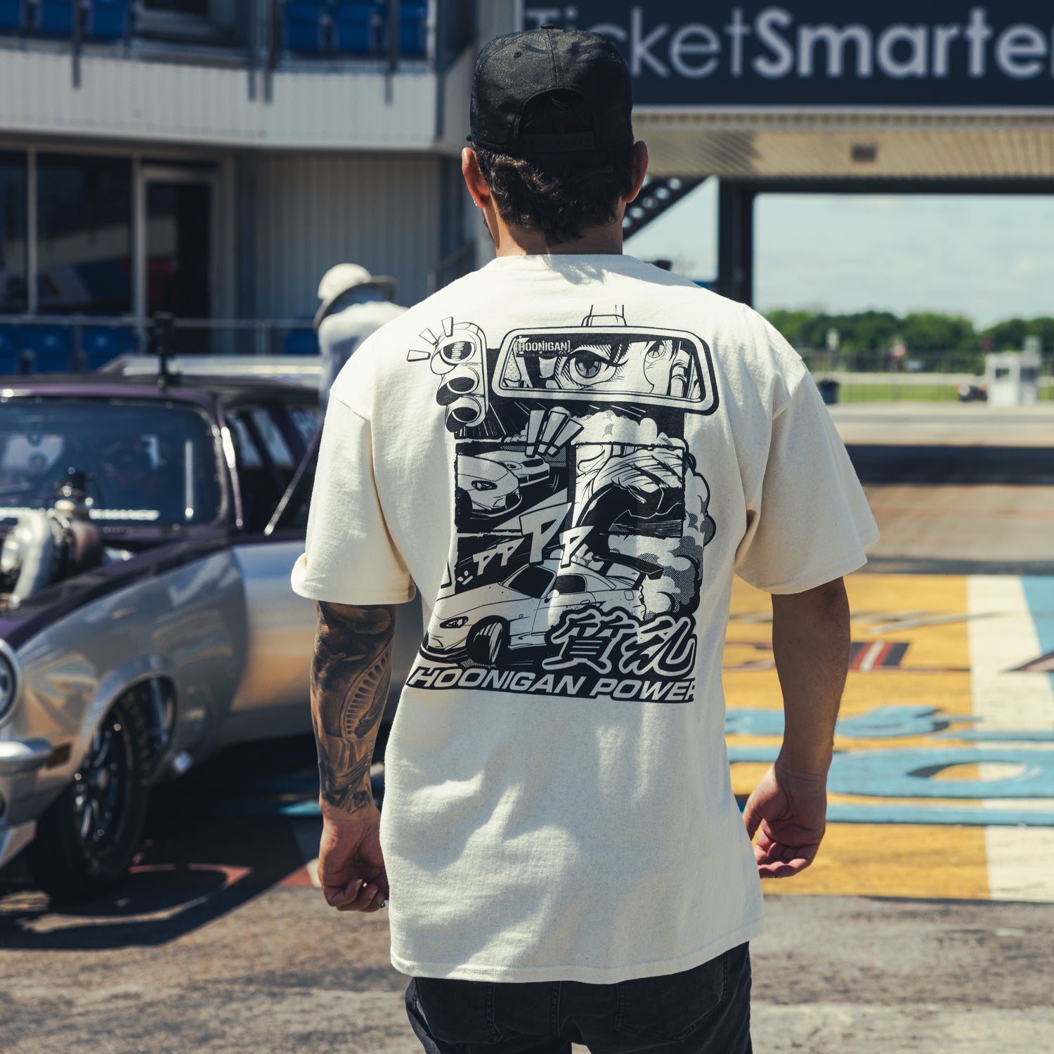 Hoonigan ON SITE short sleeve tee in black featuring bold white graphic logo on the front.