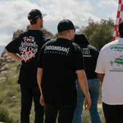 Hoonigan Motorsports short sleeve tee featuring bold graphic design, black fabric, and casual fit.