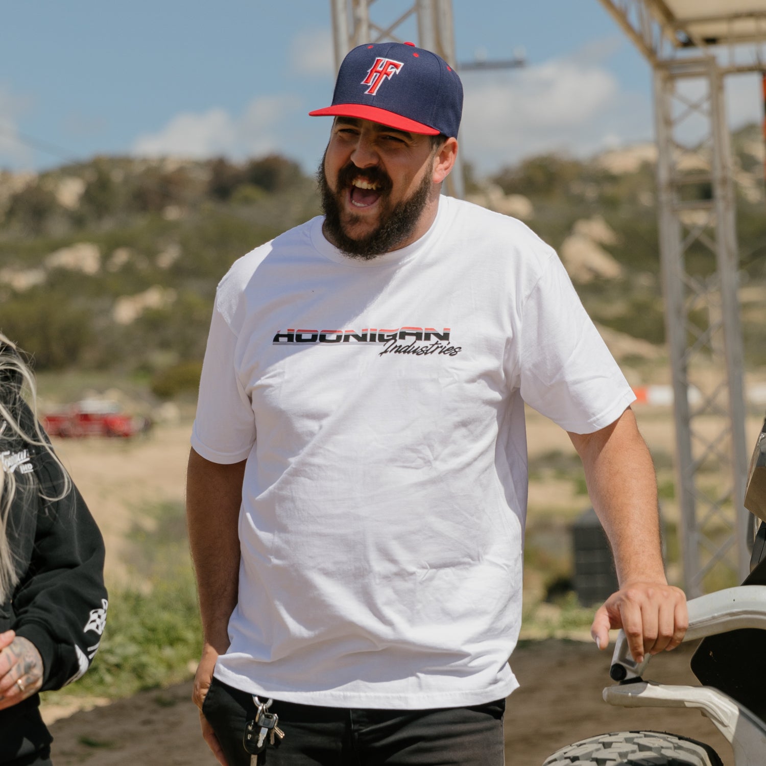 Black short sleeve Hoonigan BIG BLOCK tee featuring bold white text logo on the chest and a relaxed fit, styled on a mannequin.