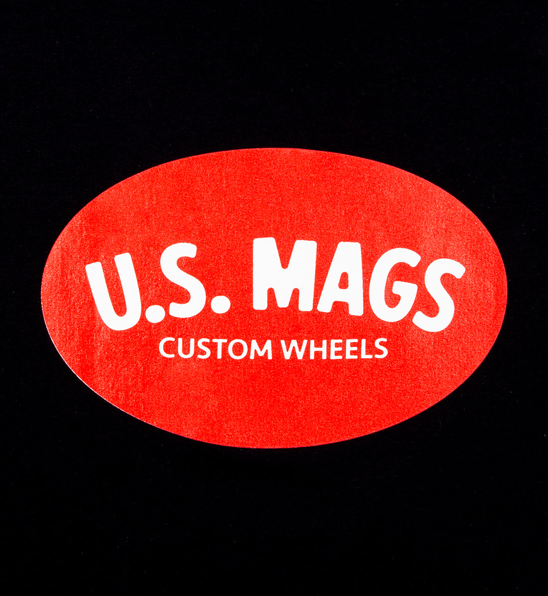 US Mags short sleeve tee in black featuring a red logo design on the back.