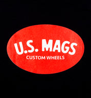 US Mags short sleeve tee in black featuring a red logo design on the back.