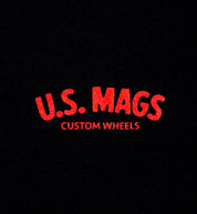 US Mags short sleeve tee featuring a red logo on a black background, showcasing a casual and stylish design.