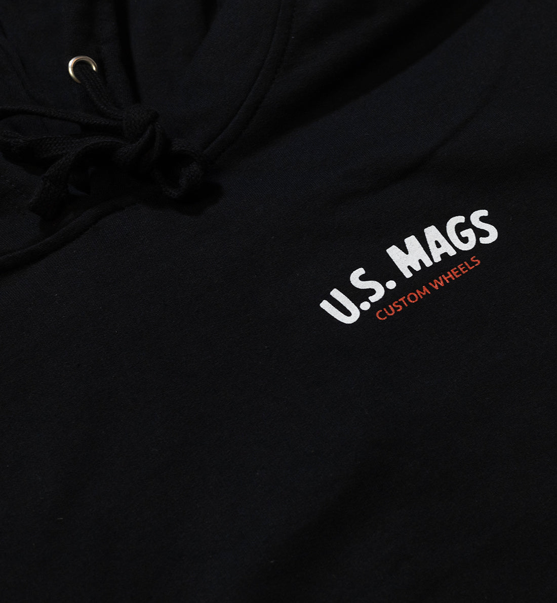 US Mags logo hoodie in black with white branding on the front and adjustable drawstring hood.