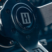 Hoonigan H BOX HORN button featuring a bold red design with "H" logo, designed for racing enthusiasts.