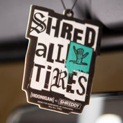 Hoonigan x Shreddy SHRED ALL TIRES air freshener featuring bold graphics and a playful design for car enthusiasts.