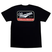 Black short sleeve t-shirt featuring Hoonigan logo and "Quality Mayhem" text on the back, ideal for motorsport enthusiasts.