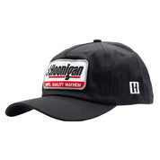 Black unstructured strapback hat featuring a bold Hoonigan logo patch and a sleek design for motorsport enthusiasts.