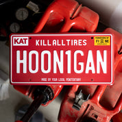 Red Hoonigan OG Arizona license plate featuring the phrase "Kill All Tires" and a playful twist on the brand name.