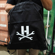 Hoonigan FIND OUT Limited Edition Steering Wheel in a stylish black bag featuring the Hoonigan logo and crossed wrenches.