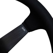 Limited edition Hoonigan steering wheel featuring a sleek black design and a 350mm diameter for enhanced grip and control.