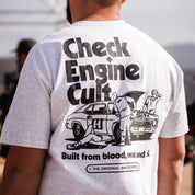 Hoonigan CHECK ENGINE CULT Short Sleeve Tee featuring a bold graphic design on a black cotton fabric.