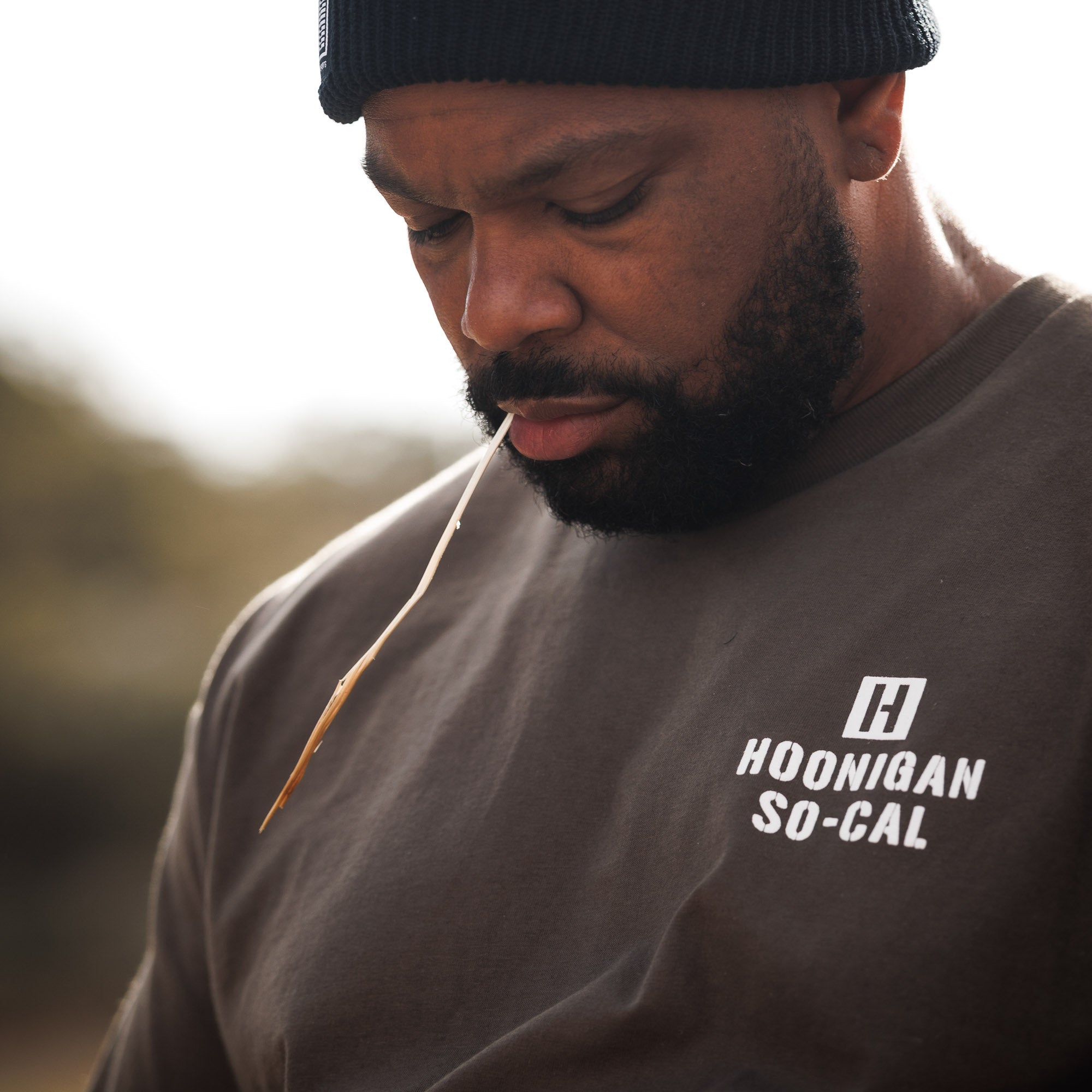 Hoonigan STENCIL Short Sleeve Tee featuring bold graphics on a black background.