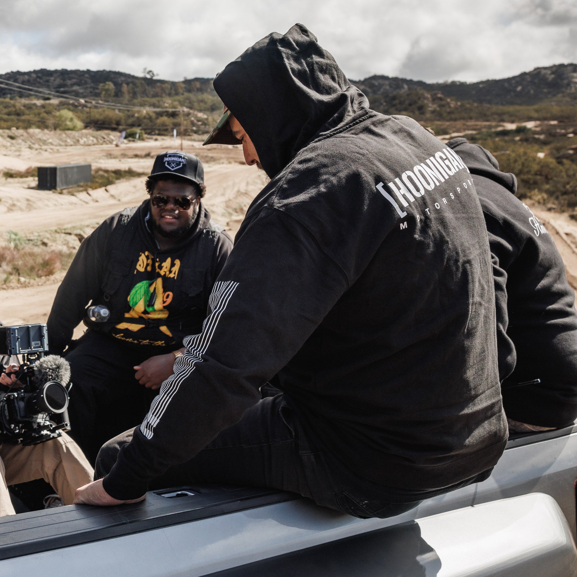 Black Hoonigan Motorsports pullover hoodie featuring a bold logo on the front, designed for motorsport enthusiasts.