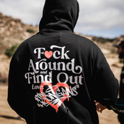 Black Hoonigan FIND OUT pullover hoodie featuring a bold white logo across the chest and drawstring hood.