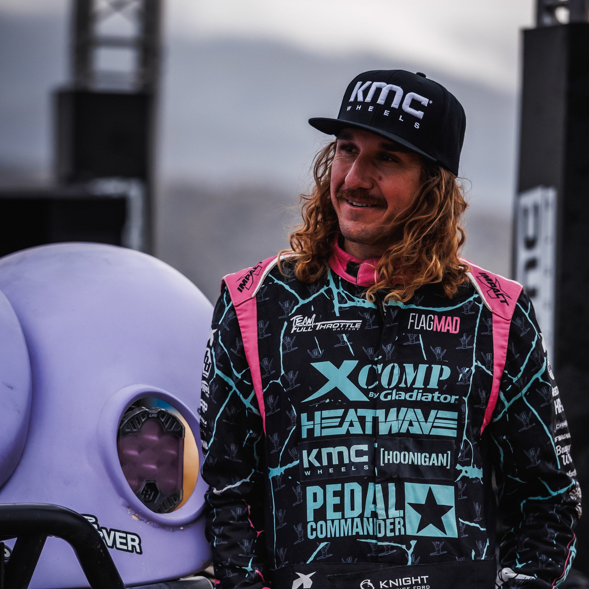 KMC LOGO Snapback Hat in black with a white logo on the front.