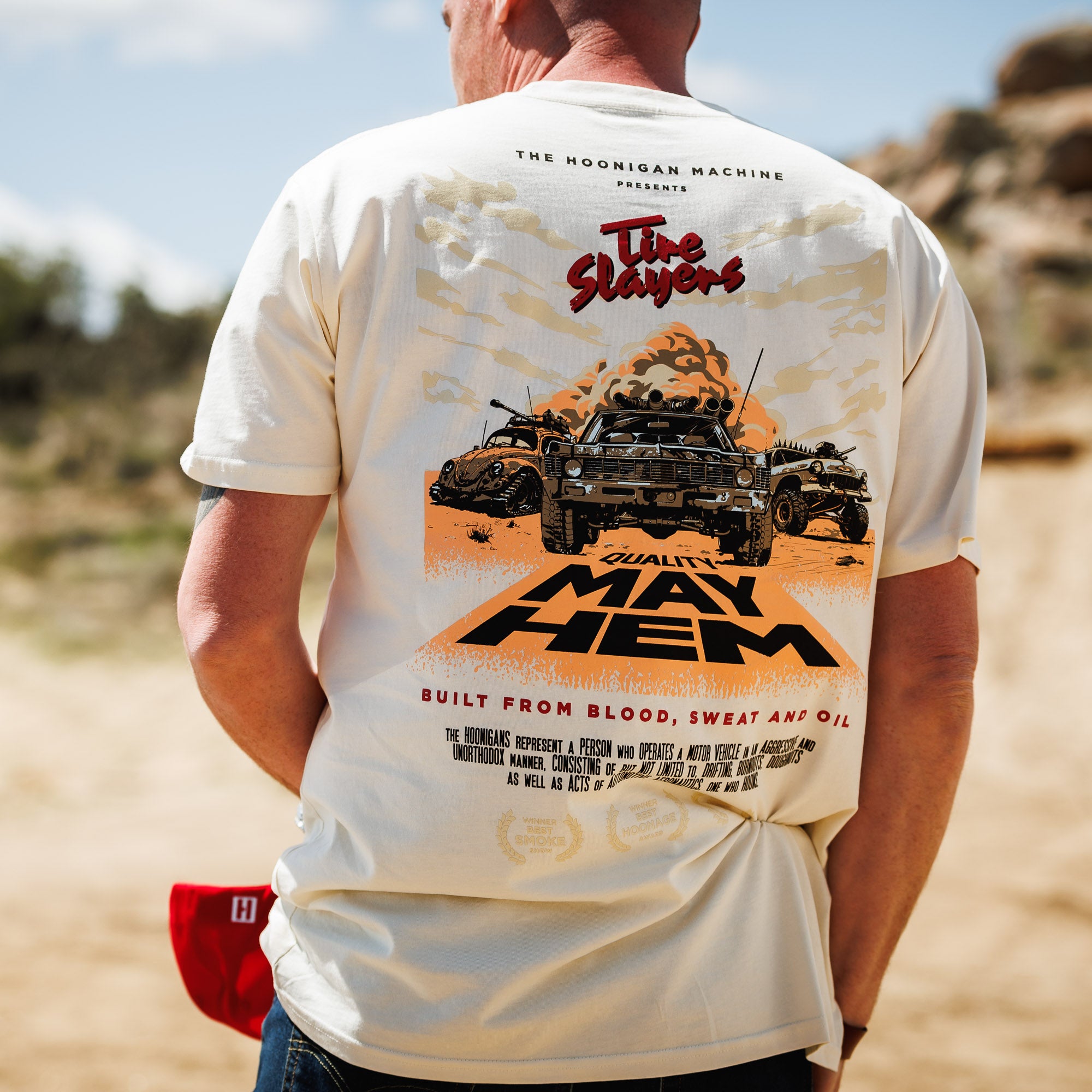 Black Hoonigan MAYHEM ROAD short sleeve tee featuring a bold graphic design on the front, showcasing a blend of racing and automotive elements.