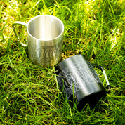 Stainless steel Carabiner Mug with topographic design and attached carabiner clip, ideal for outdoor adventures and camping.