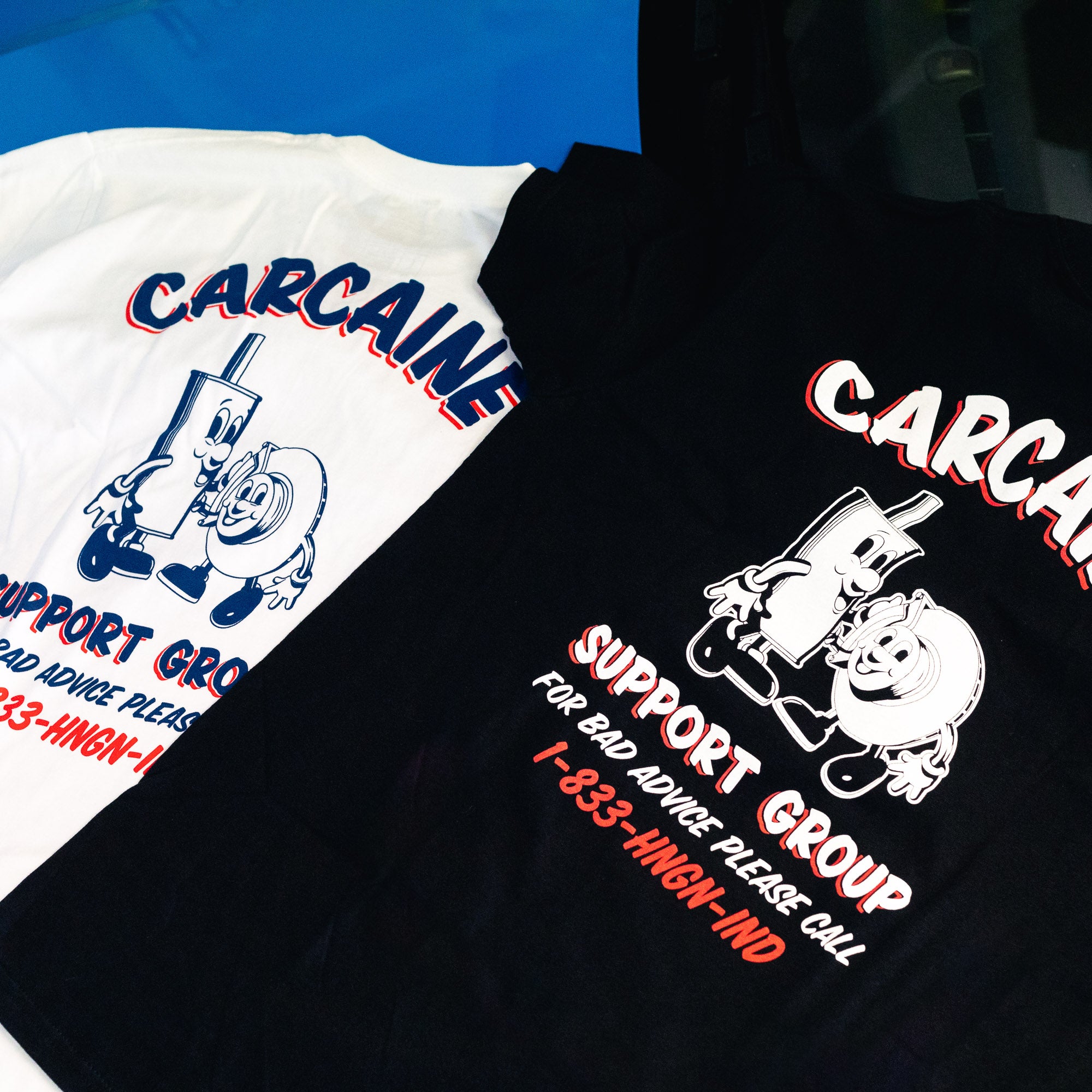 Hoonigan CARCAINE SUPPORT GROUP short sleeve t-shirt featuring a bold graphic design in white on a black background.