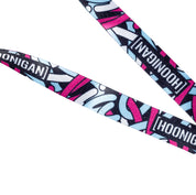 Colorful Hoonigan x Lia Block SCRIPT lanyard featuring bold graphics and branding, perfect for motorsport enthusiasts.