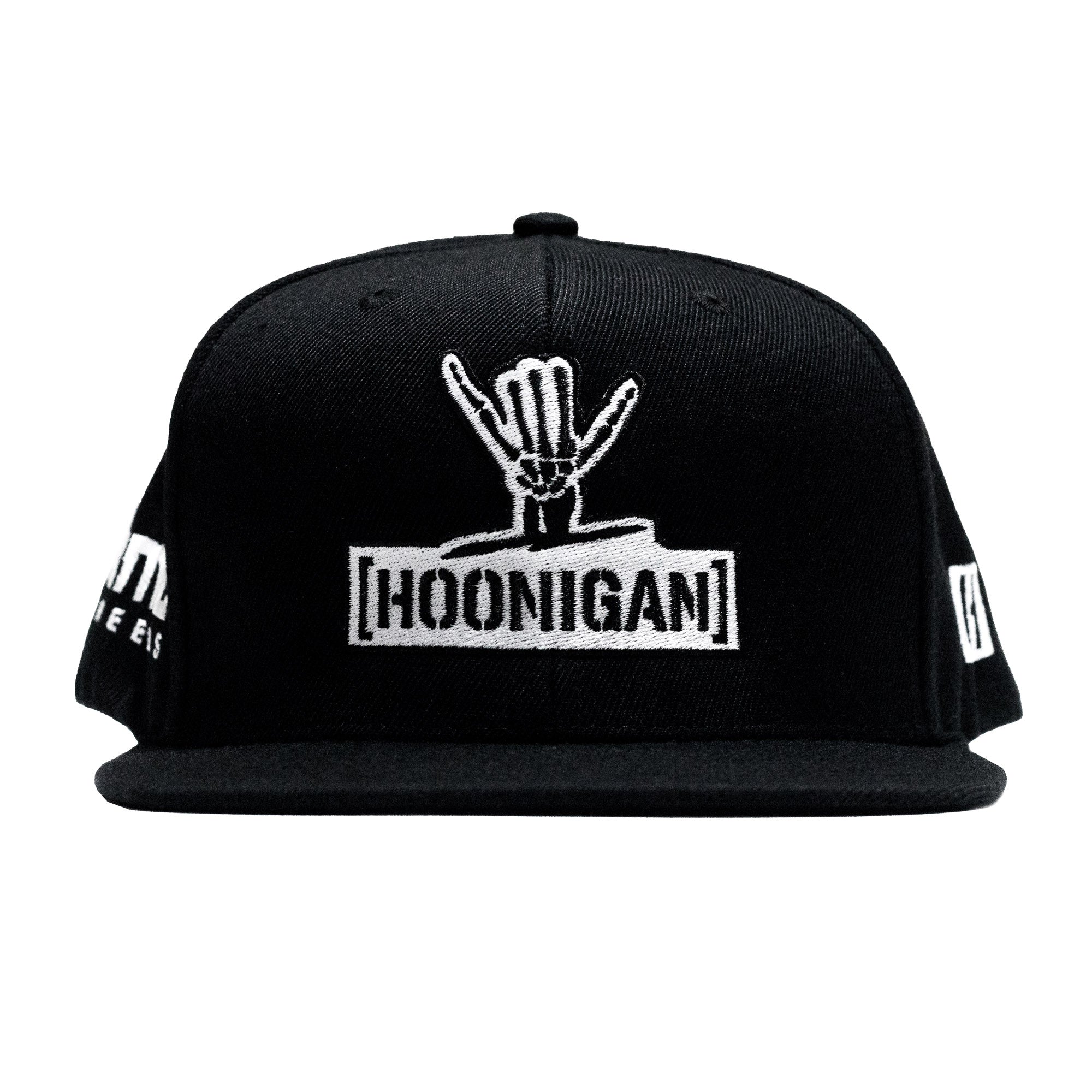 Black snapback hat featuring the Hoonigan logo and Shreddy graphic, perfect for motorsport enthusiasts and car culture fans.