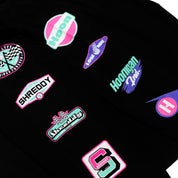 Black long sleeve t-shirt featuring colorful Hoonigan and Shreddy logos and graphics, perfect for motorsport enthusiasts.
